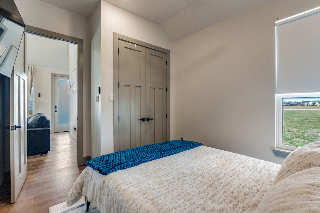 Cozy ADU bedroom interior with closet space by Estate ADU in Fort Worth, TX.