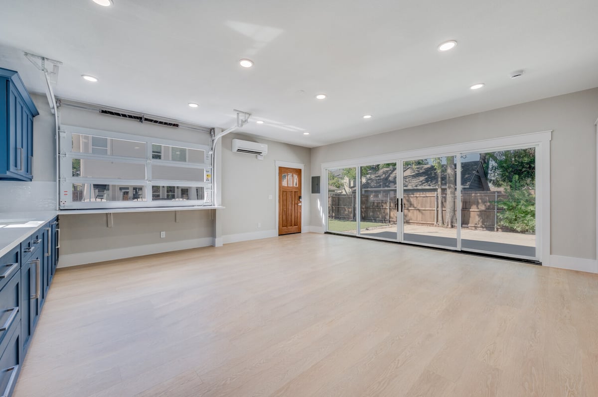 Empty interior view of custom ADU in Dallas, TX built by Estate ADU showcasing natural light and open layout.
