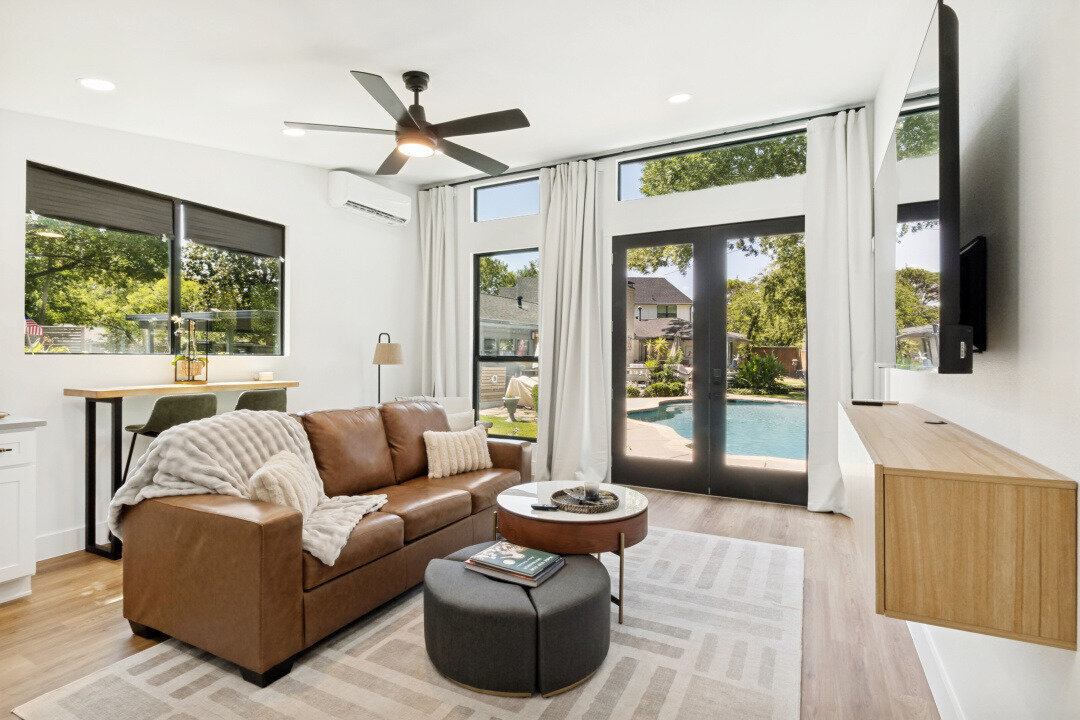 ingleside pool house living room pool view doors