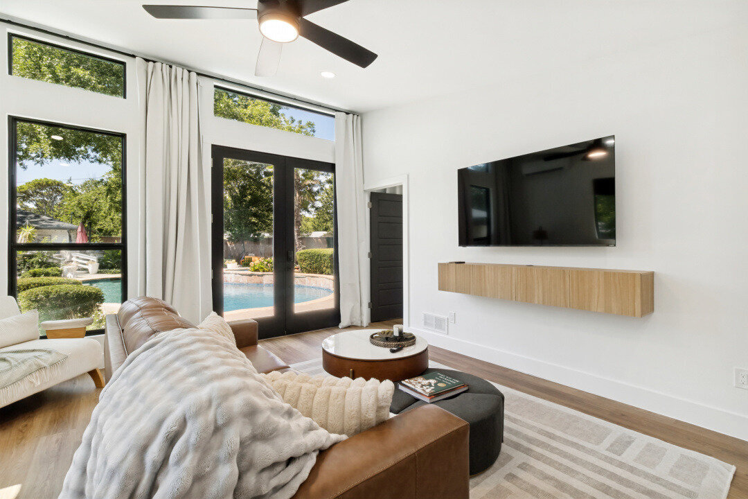 ingleside pool house living room tv wall doors